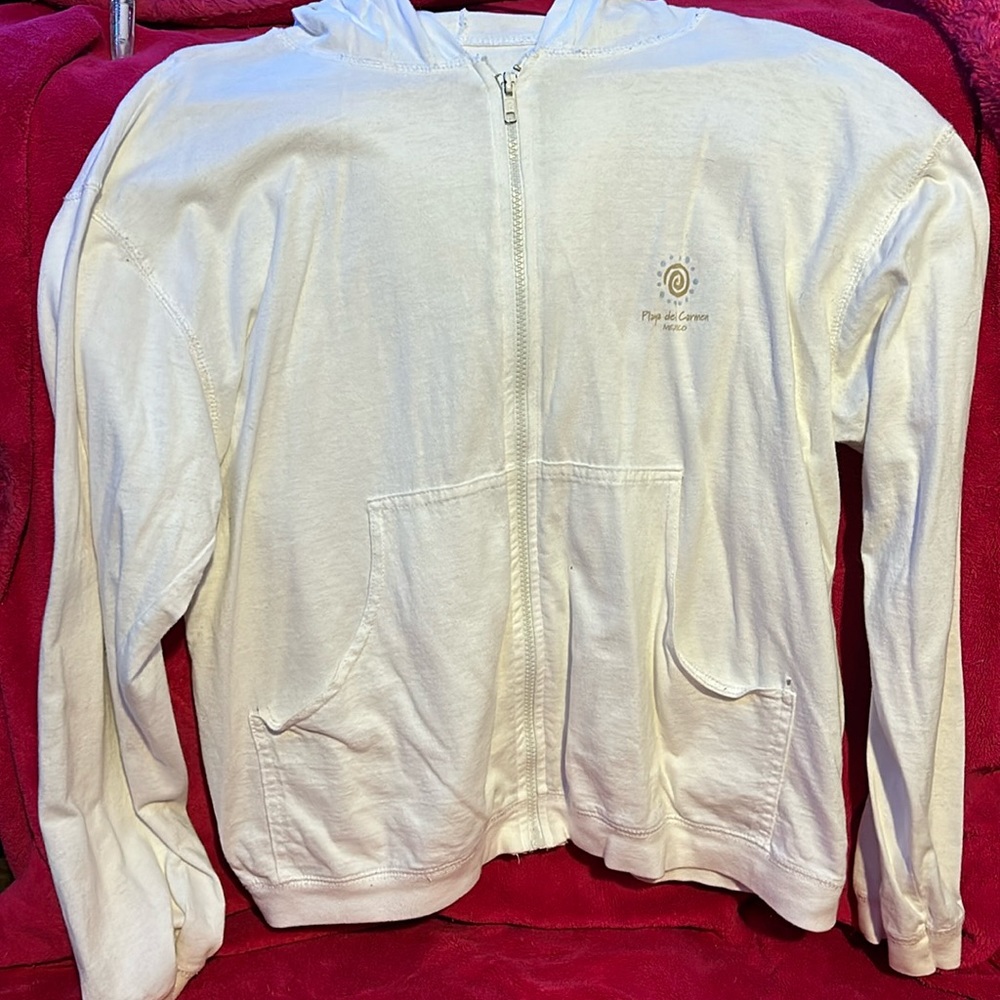 This is a white zip up that my mom gave me and now I have no more room for it.
